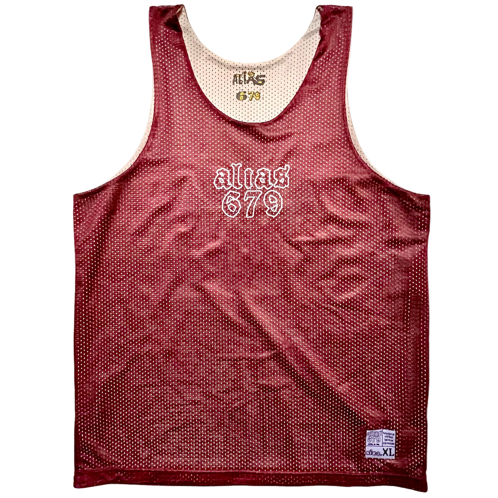 Red mesh tank top with 'alias 679' branding on a white background