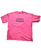 Pink t-shirt with 'Detroit Princess' text on a white background