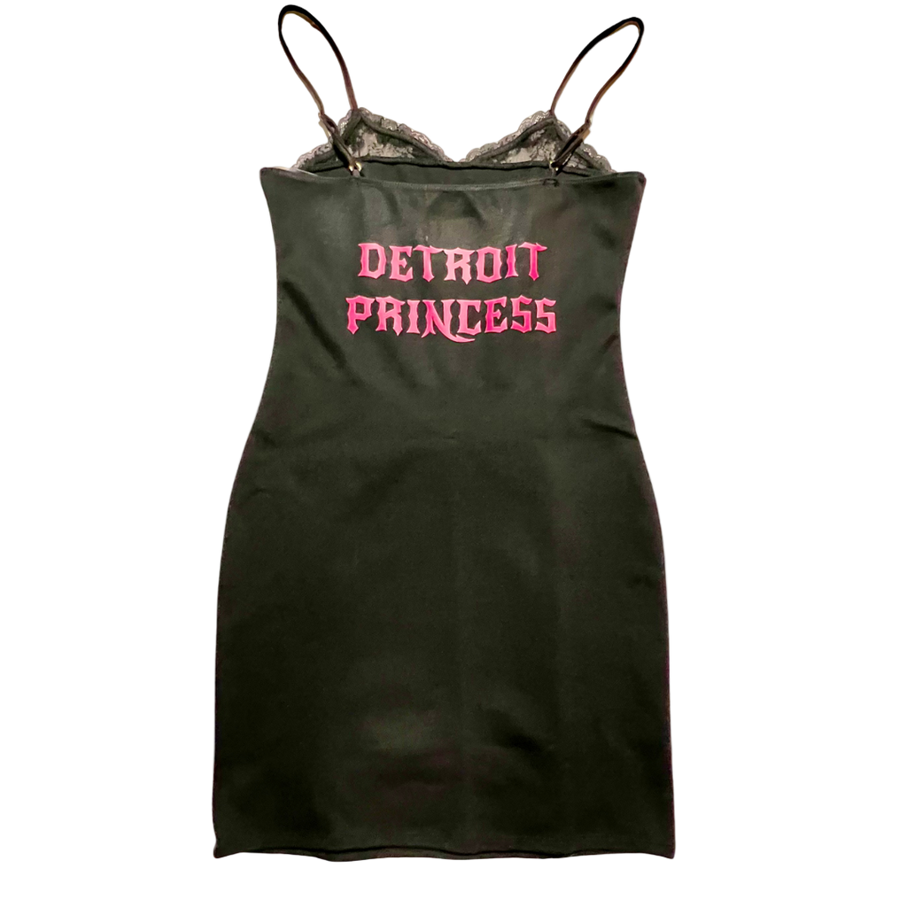 Black slip dress with 'Detroit Princess' text in pink on a white background