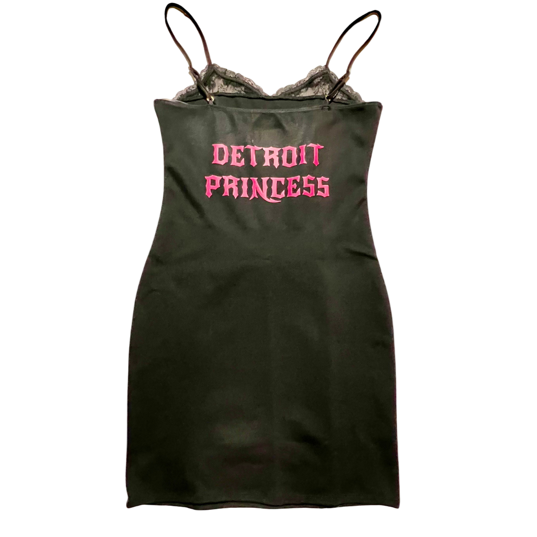 Black slip dress with 'Detroit Princess' text in pink on a white background