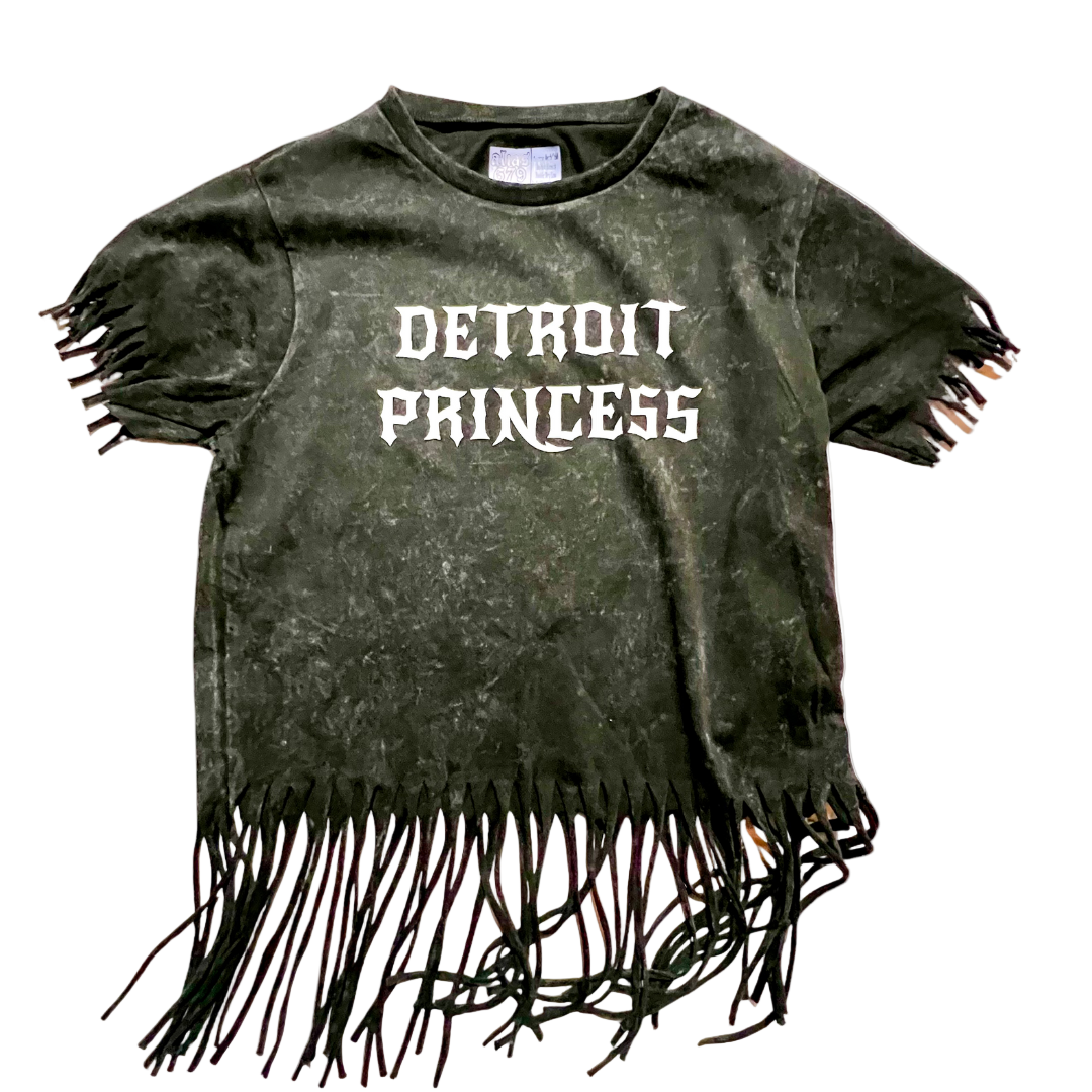 T-shirt with 'Detroit Princess' text and fringe details on a white background